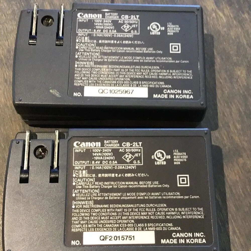 Pair of Cannon CB-2LT camera battery chargers